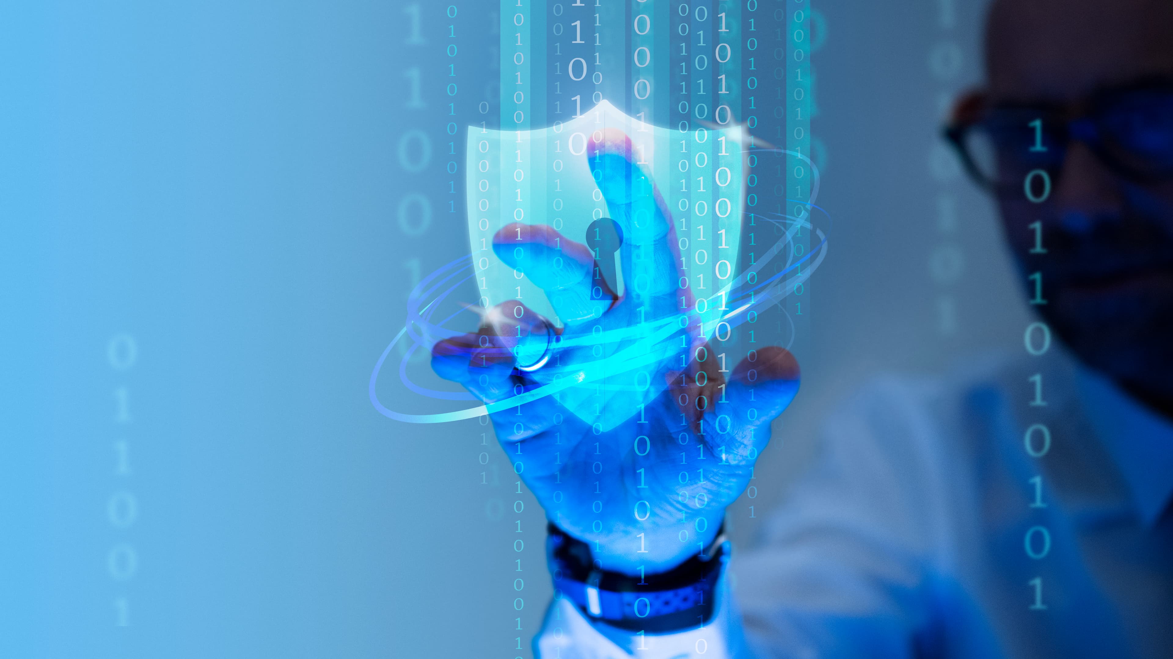 Developer reading documentation on laptop